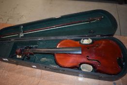 A vintage Violin, labelled Maidstone, in some disrepair, with case and bow