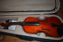 A modern violin, Antoni ACV 30, in case with bow