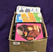 A box of various 7' singles - a lot in original picture sleeves - approximately 100