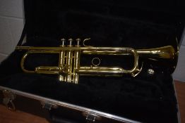 An Amati ATR-211 trumpet, in hard shell case with plush lining, includes mouthpiece