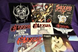 A lot of eight album from Saxon and Motorhead - heavy rock interest