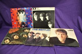 A lot of Beatles and related vinyl albums with a nice mono Rubber Soul in VG/VG+ with some fade to