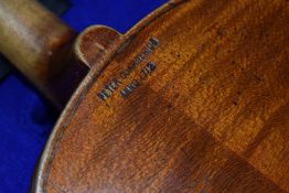 A traditional violin, having 2 piece back, approx 14in, stamped to back 'Peter Guarnerius, Anno