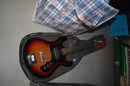 An electric guitar and accesories