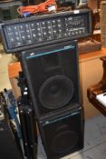 A Peavey XR500C mixer amp, pair of Eurosys 2 speakers and speaker stands
