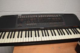 A Casio CTK-1000 keyboard, in padded gig bag and with folding keyboard stand