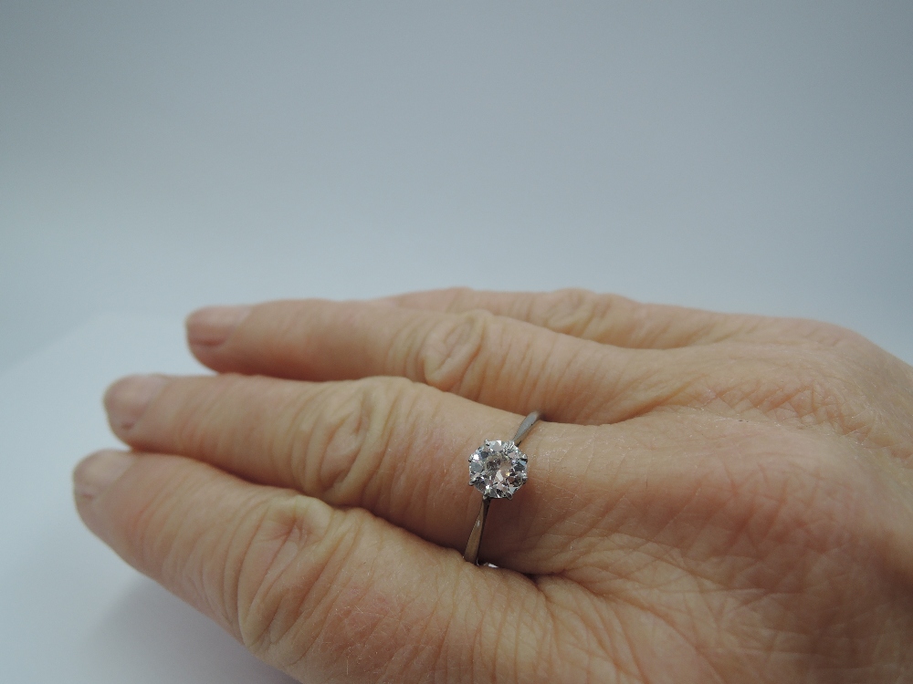 A diamond solitaire ring, approx 1ct in a claw set mount on a white metal loop stamped Plat & - Image 2 of 3