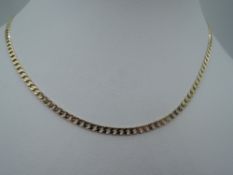 A 9ct gold flat curb chain, approx 18' & 8g