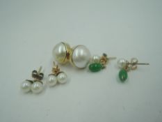 Three pairs of cultured pearl stud earrings of various forms, all in yellow metal mounts, approx 7.
