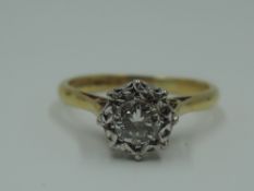 A diamond solitaire dress ring, approx 0.5ct in an illusionary setting to knife blade shoulders on