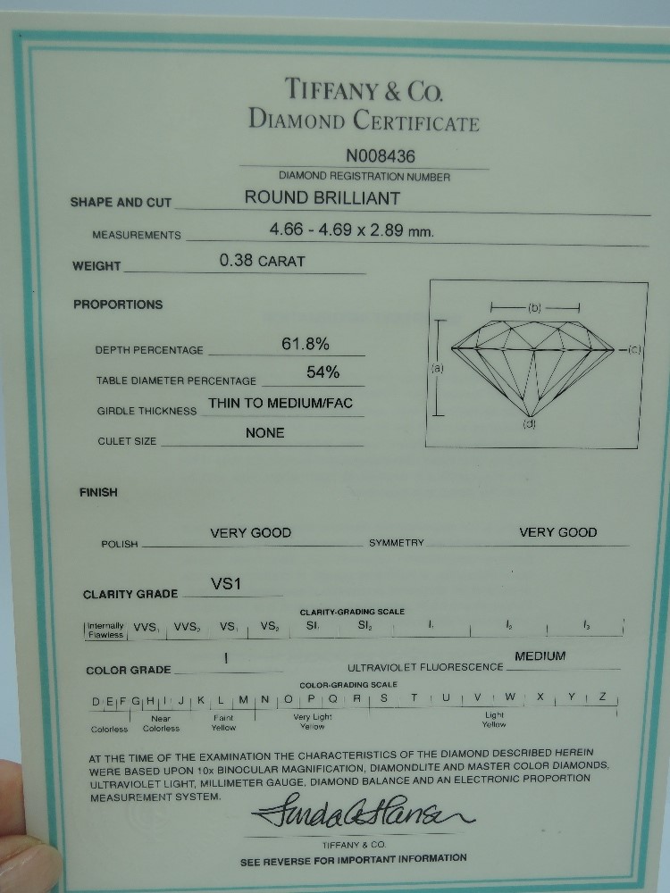 A Tiffany diamond solitaire ring, having a brilliant cut diamond approx 0.38ct VS1, colour grade I - Image 6 of 6