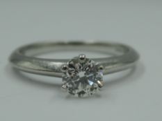 A Tiffany diamond solitaire ring, having a brilliant cut diamond approx 0.38ct VS1, colour grade I