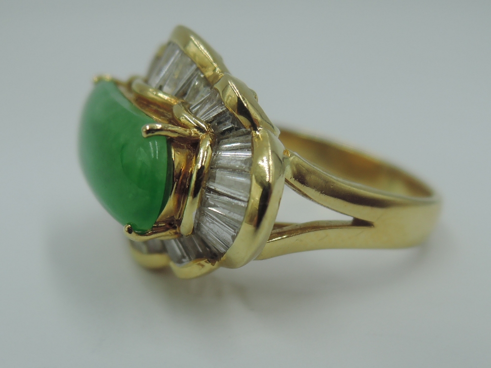 A jadeite cabouchon dress ring, approx 2.8ct within a baguette diamond set ballerina frilled - Image 4 of 5