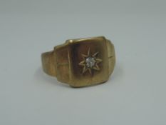 A 9ct gold signet ring having a diamond insert, size M & approx 4.3g, (diamond AF)