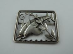 A Georg Jensen silver double dolphin brooch of open form, no 251, London 1962, Georg Jensen Ltd,