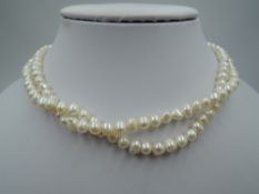 A long string of baroque pearls approx 46'