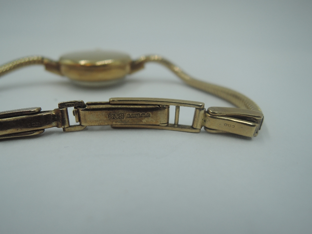 A 9ct gold vintage wrist watch by Smiths having Arabic numeral dial with subsidiary seconds on a 9ct - Image 2 of 2