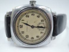 A gent's 1920's Rolex Oyster wrist watch having Arabic numeral dial with subsidiary seconds to