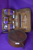 An early 20th century dress brush set and leather collar box or case