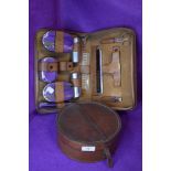 An early 20th century dress brush set and leather collar box or case