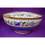 A punch or fruit bowl by Spode Copeland having exotic bird decoration