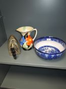 An art deco water jug hand decorated with flowers, a tureen and a stove top iron