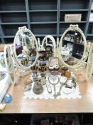 A good selection of dressing table items including mirrors brush set and cigarette lighters