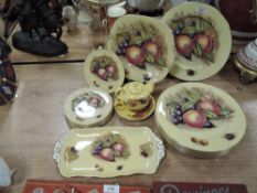 A selection of ceramics by Aynsley in the Orchard Gold design