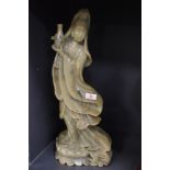 A large standing soap stone carved figure of a Chinese temple dancer standing approx 50cm tall