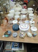 An assortment of trinket dishes, commemorative wares and perfume bottles.