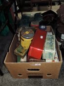 A selection of collectable advertising tins and boxes