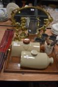 A mixed lot of items including vintage brass and pewter wares,two stone hot water bottles, mirror,