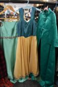 A selection of vintage items including gown with full skirt and hook and eyes to back and emerald