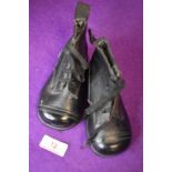 A pair of vintage 20s/30s leather childrens boots, appear to be unworn.