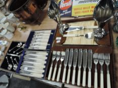A selection of flat ware including boxed fish knives, spoons and more.