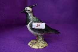 A figure study of a Lapwing by Beswick AF