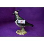 A figure study of a Lapwing by Beswick AF