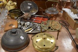 A selection of serving and fireside items including copper stove kettle