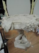 A victorian marble/crystaline tazza having grape vine and mythical fish carved detailing,AF