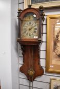 A Victorian Frisian tail wall clock having painted face and mahogany case