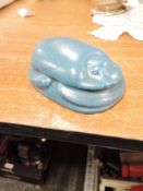 A Pilkingtons Lancastrian art deco paper weight in blue glaze in the form of an Egyptian scarab