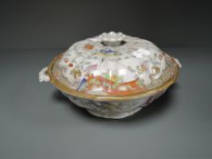 A lided tureen by Iron Stone