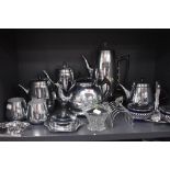 A selection of stainless steel kitchen wares including tea set and kettle