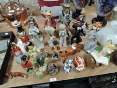 A collection of figurines, mainly foxes, including Beswick and more.