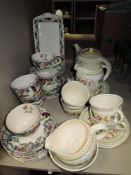 A selection of tea cups and saucers including Wood and sons Brier and Royal Cauldon Victoria