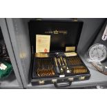 A cased Bestecke Sollingen 23/24ct. gold plated cutlery set.