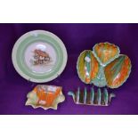 Four art deco ceramics by Shelley including toast rack and Eric W Slater painted plate.