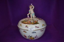 A 19th century KPM fruit bowl or lidded punch bowl having cherub to lid and hand painted classical