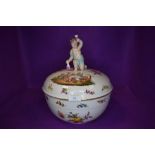 A 19th century KPM fruit bowl or lidded punch bowl having cherub to lid and hand painted classical