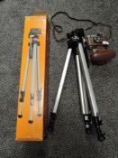 A Halina 35x film camera and a boxed tripod